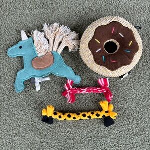 Dog toys gently (barely)used or new. Suede unicorn, doughnut & 2 cloth sticks